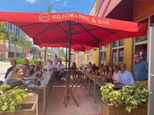 The FLN Doral Chapter members meeting at a restaurant.